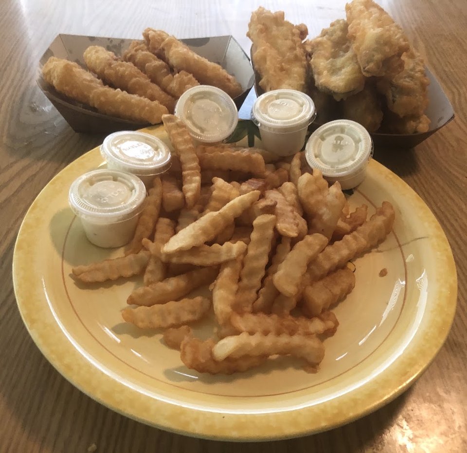 Seafood combo choices with coleslaw on the side.