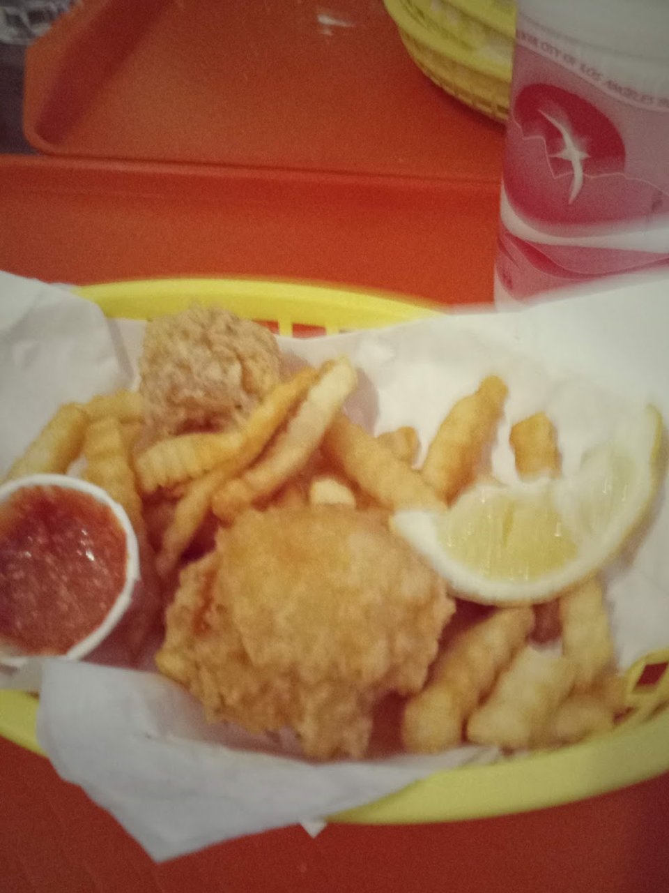 Seafood combo choices with coleslaw on the side.