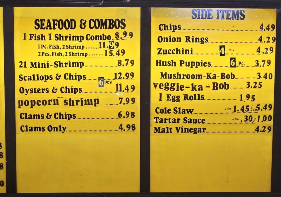 Printed menu with fish, shrimp, and chicken combos.