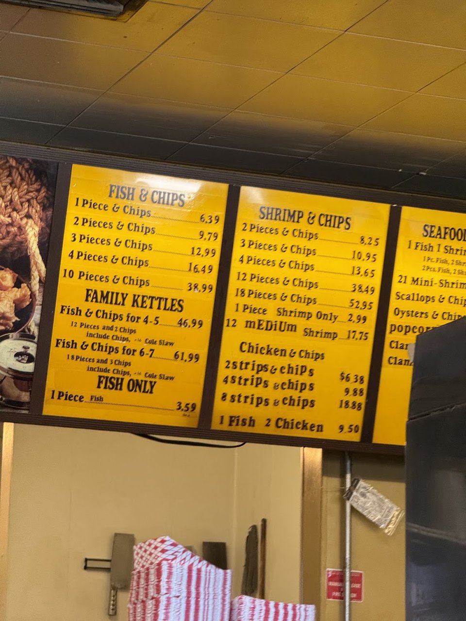 Seafood combo choices with coleslaw on the side.